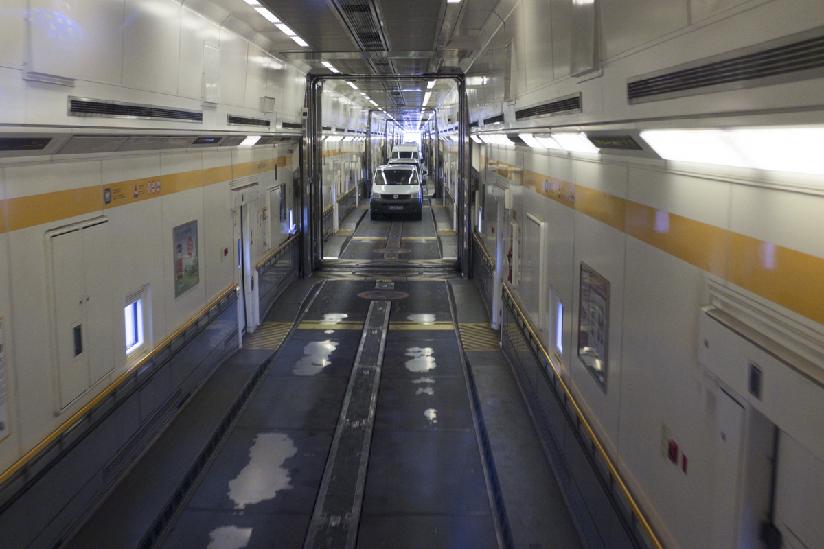 This is taken from the back of the bus - you can see the cars sort of lining up and the bus gets its own sort of cabin. Once the train starts going you can actually get out and walk around the cabin of the car. Theres bathrooms and everything. Pretty crazy.