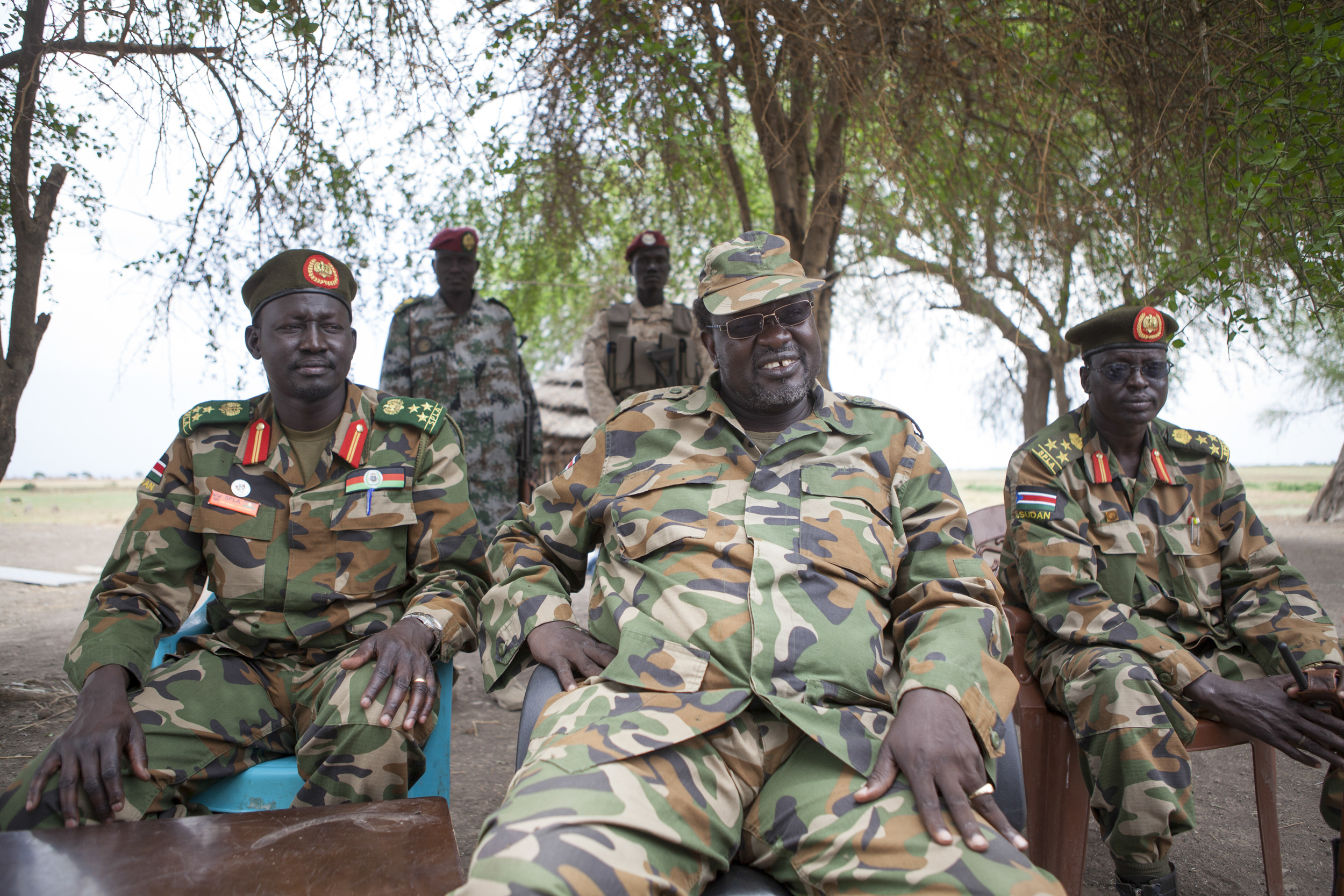  Riek Machar, leader of the South Sudan Rebel Army (SPLA) sits with top ranking officials in a camp near the border of Ethiopia. 