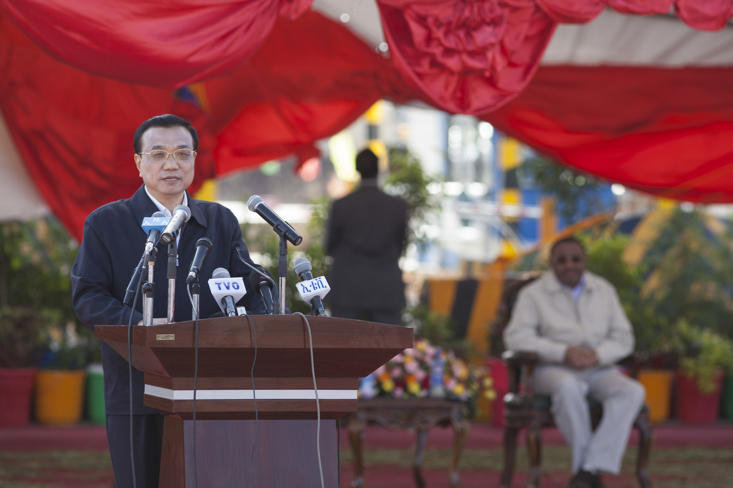   Li Keqiang, Chinese Prime Minister Li Keqiang gives a speech at the site of the Addis Ababa Adama toll road on May 5, 2014, after he christened the site. Li arrived in Ethiopia for the start of a four-nation African tour, his first visit to the con