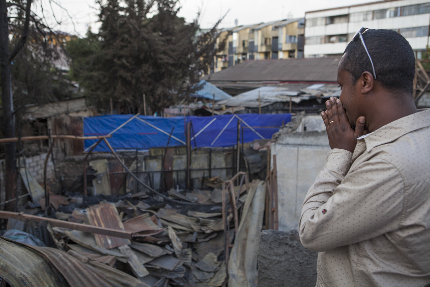 Misale Legesse, an Ethiopian jazz drummer, is pictured on 16 Feb 2015 surveying the damage from the fire that ripped through Jazzamba, a jazz club in Addis Ababa, in mid Jan 2015. The club was inside the oldest hotel in the country, Taitu, which was