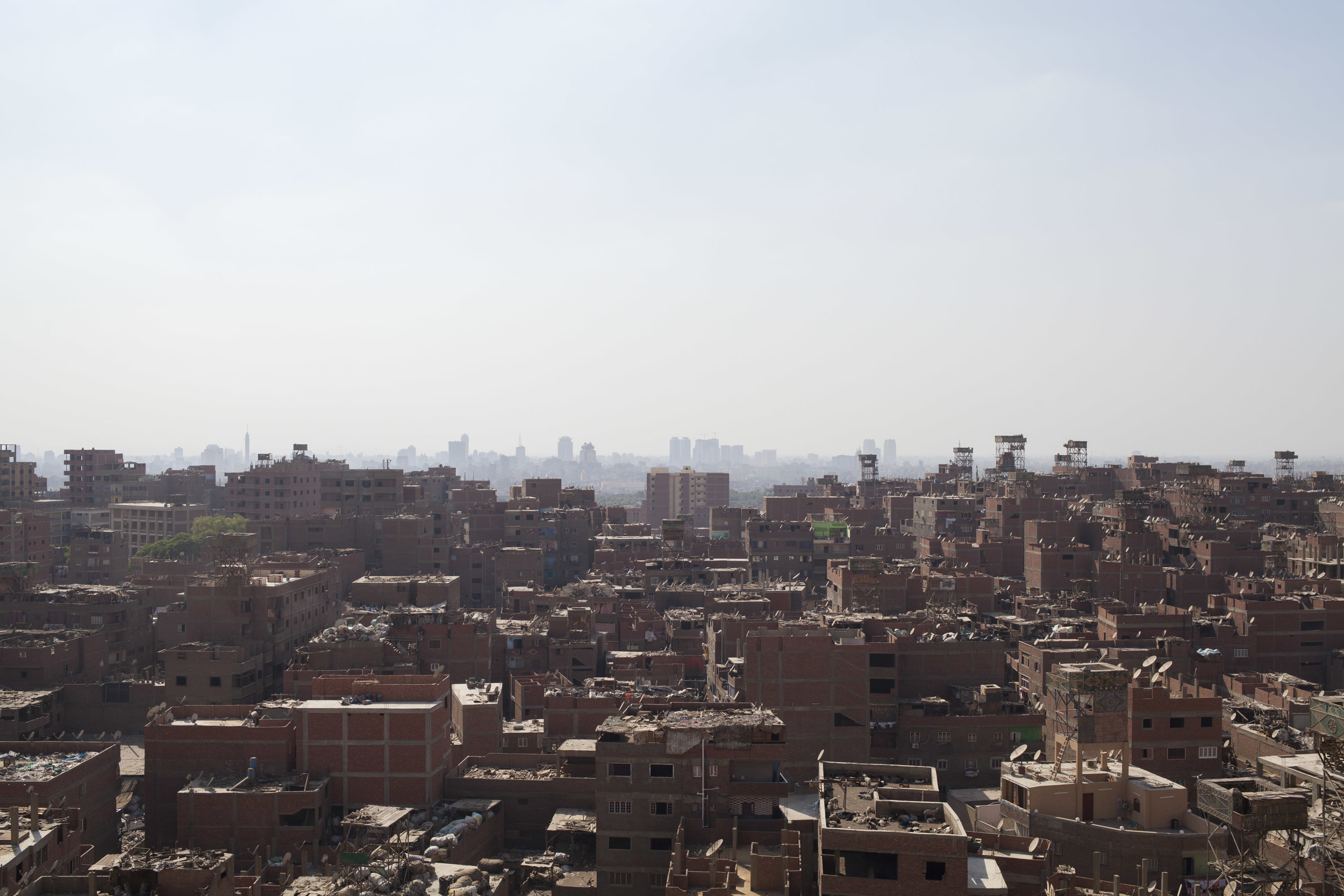 A view of Garbage city, and the eastern part of Cairo in the background.