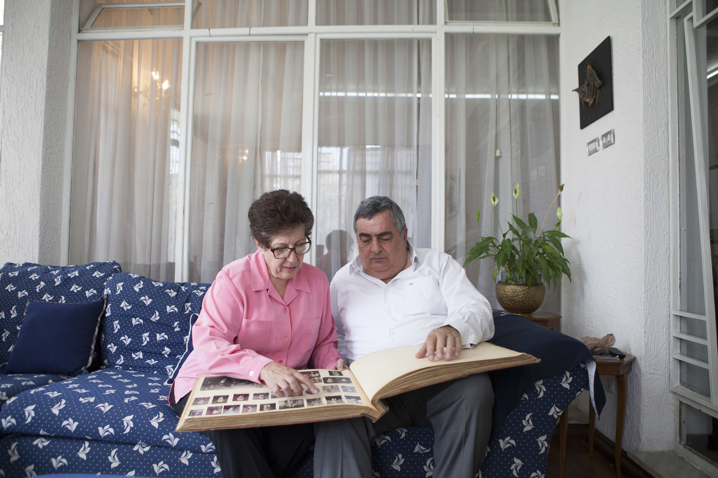  Mary and Vartkes Nalbanian, Ethiopian born Armenians, are pictured looking at old family pictures of Armenians in Ethiopian on 20 April 2015. The Nalbanian is one of the few remaining Armenian Ethiopian families living in Addis Ababa. There are roug