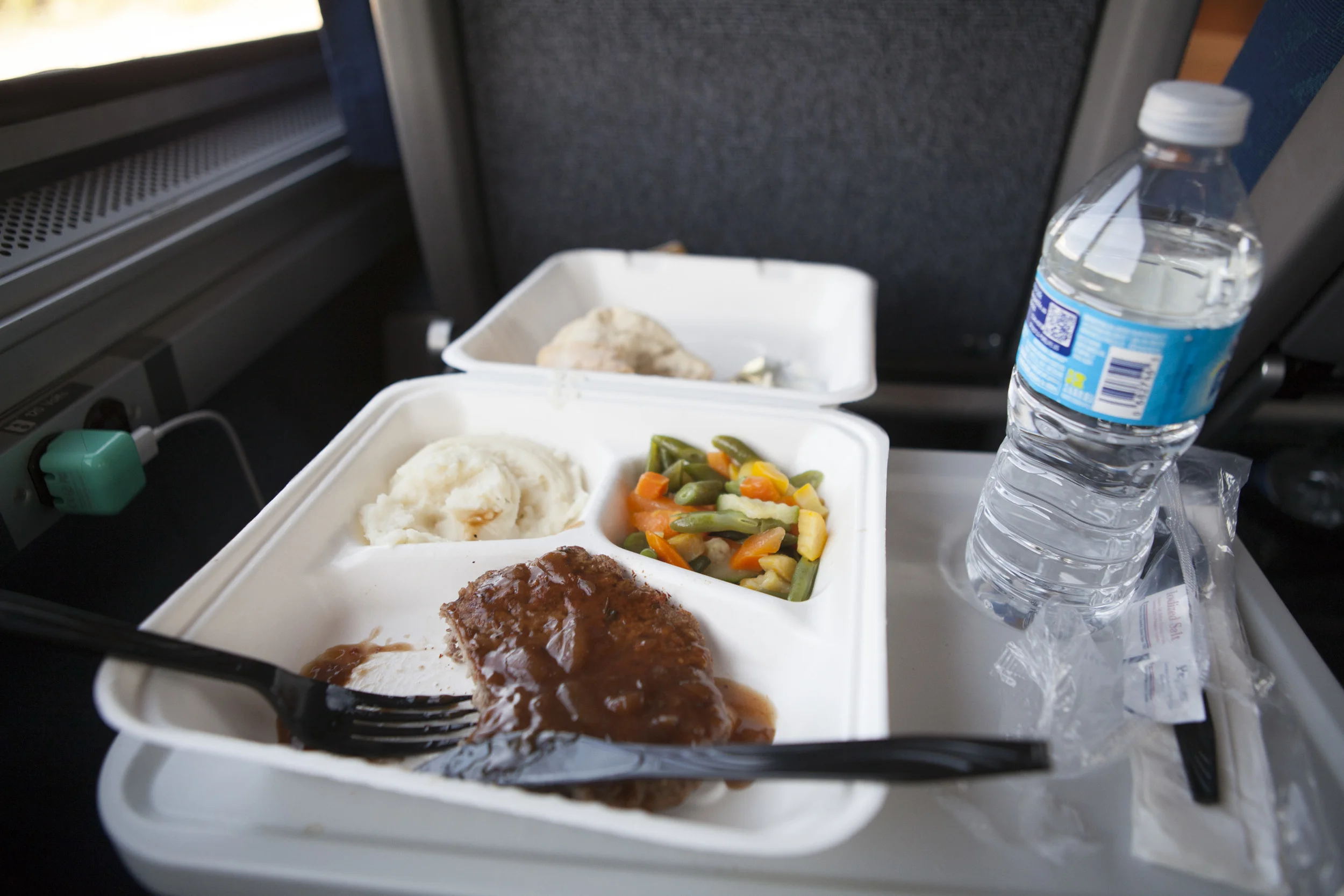 Not so interesting meal: repurposed hamburger turned salisbury steak. About all I could manage after I was banned from using my card at the Cafe car and ran out of cash. 