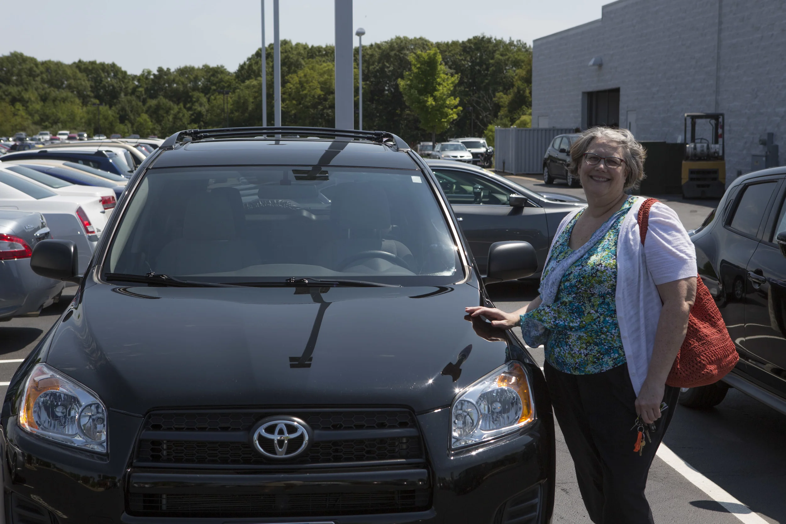 Mom with her new car