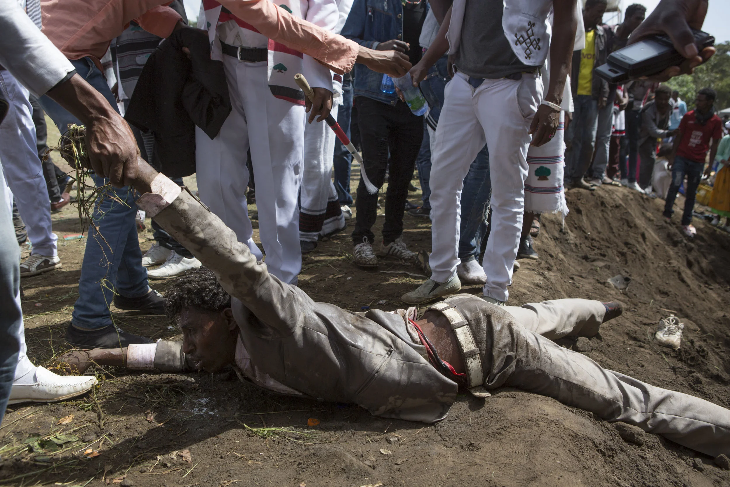 A man is pulled from the ditch.