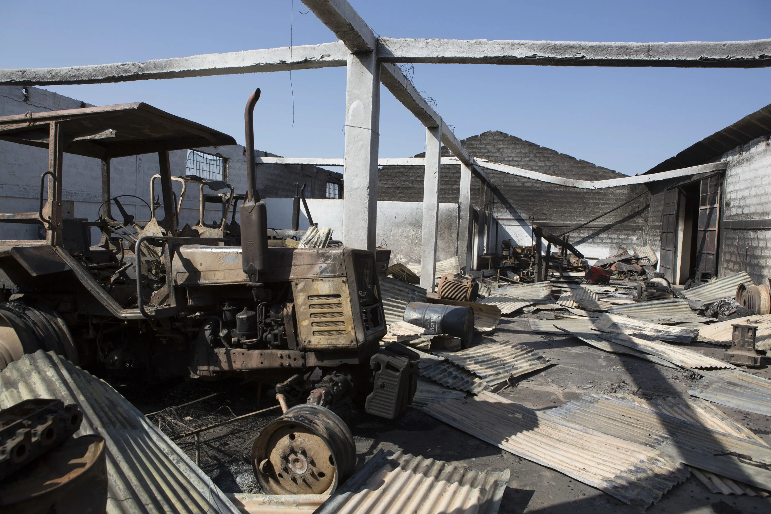 A destroyed workshop on the compound of Africa Juice, a Dutch owned juice factory, about two hours south of Addis Ababa, outside of Adama town. Credit: Zacharias Abubeker / AFP
