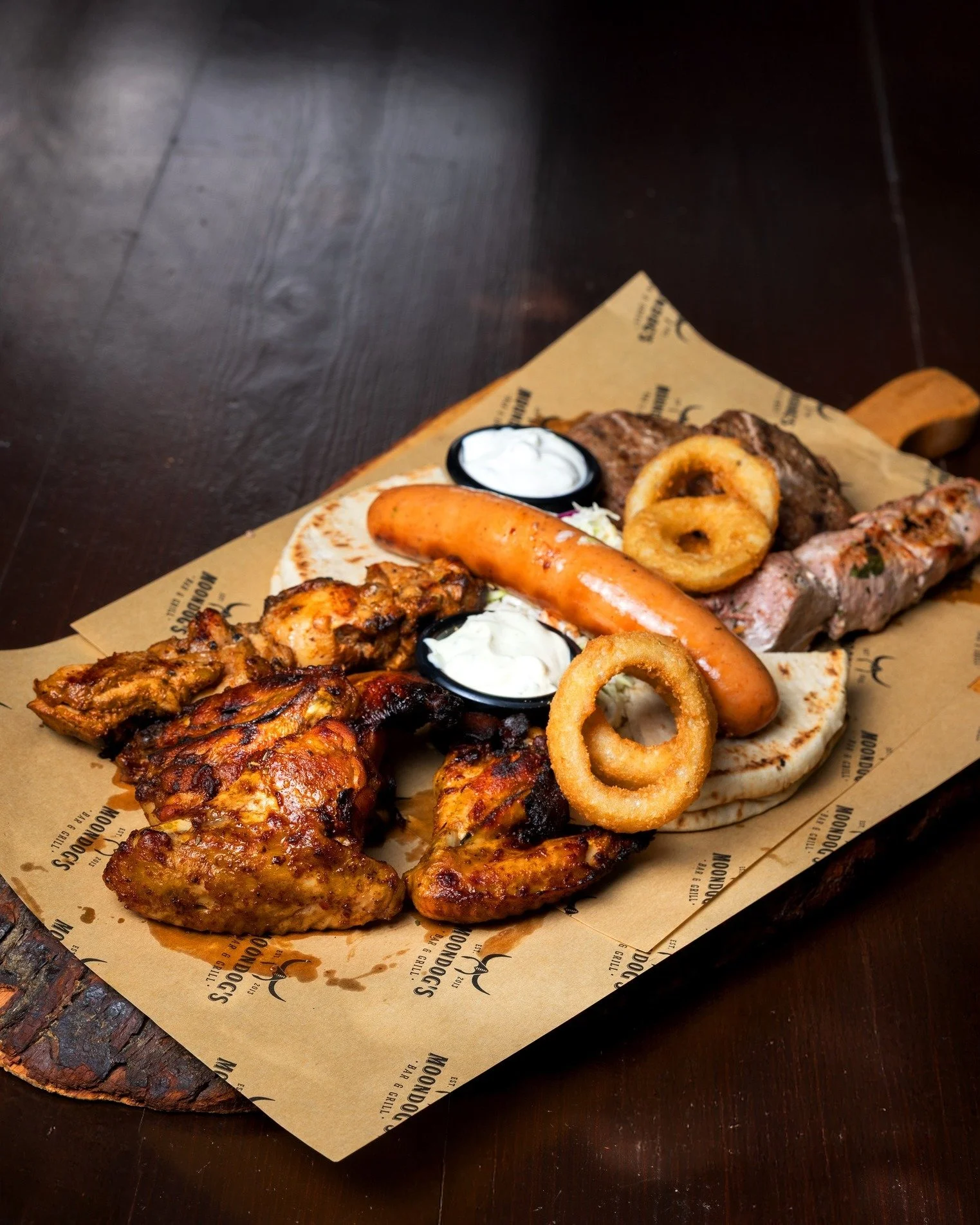 Gather, share, enjoy, your table is waiting 🍻🍴

reservations:
🔗 Online t.ly/BRs4k
📞 Call us at 7000 6300
🛵 Delivery with #Wolt, #Bolt &amp; #Foody
.
.
.
.
#moondogscy #nicosiaeats #cyprusfoodies #foodpairing