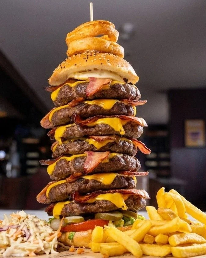 Sometimes, size DOES matter. 📏

Introducing the Thunderstruck x3. The only burger that requires a building permit just to be served! 🏗️🍔

Are you ready for the challenge, or are you going to need a backup crew?

📍 Available on our menu (maybe...)
