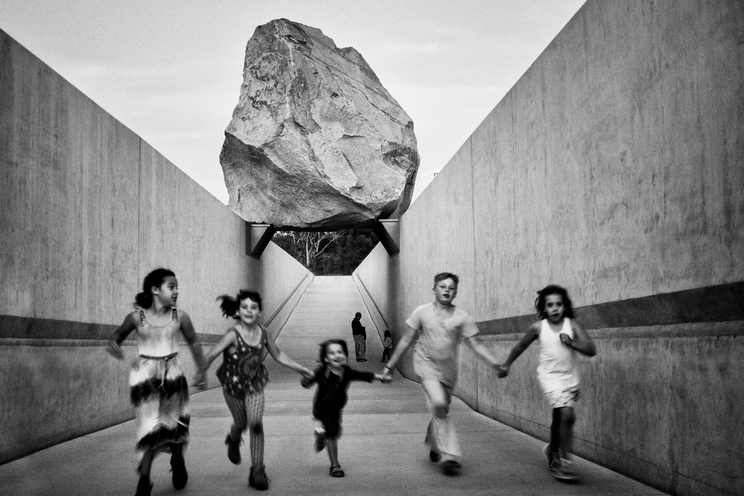 lacma-levitating-rock-children-running-under-it.jpg