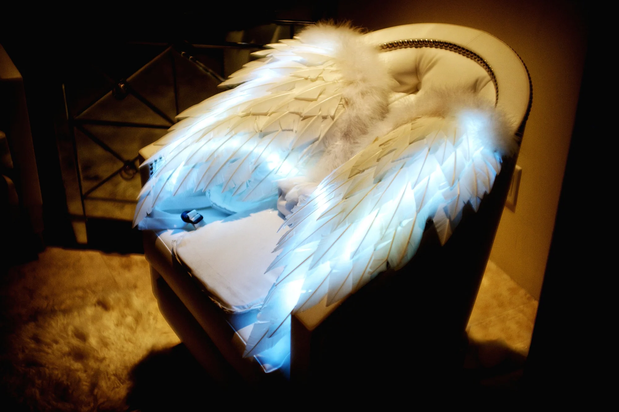 wings-left-on-chair-after-heaven-can-wait-theme-aprty-is-over.jpg