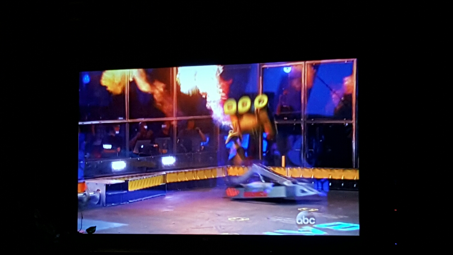 "Bronco" Flipping "Stinger" OVER the wall, near the audience (while flamethrower was still active)
