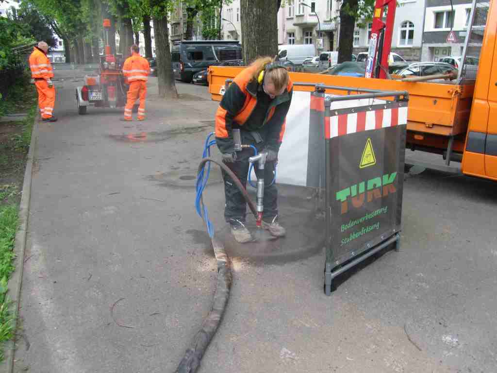 trees can be treated through pavements, then vents are installed to permanently improve aeration