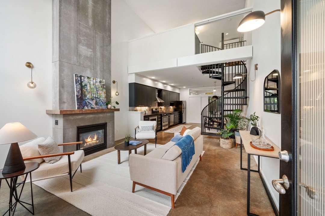 Welcome to your urban oasis! 🌟 Step into luxury in the vibrant N Williams District. This chic townhouse boasts soaring ceilings, skylights, and a cozy gas fireplace. With a newly updated kitchen and baths, plus a private patio, every moment is pure 