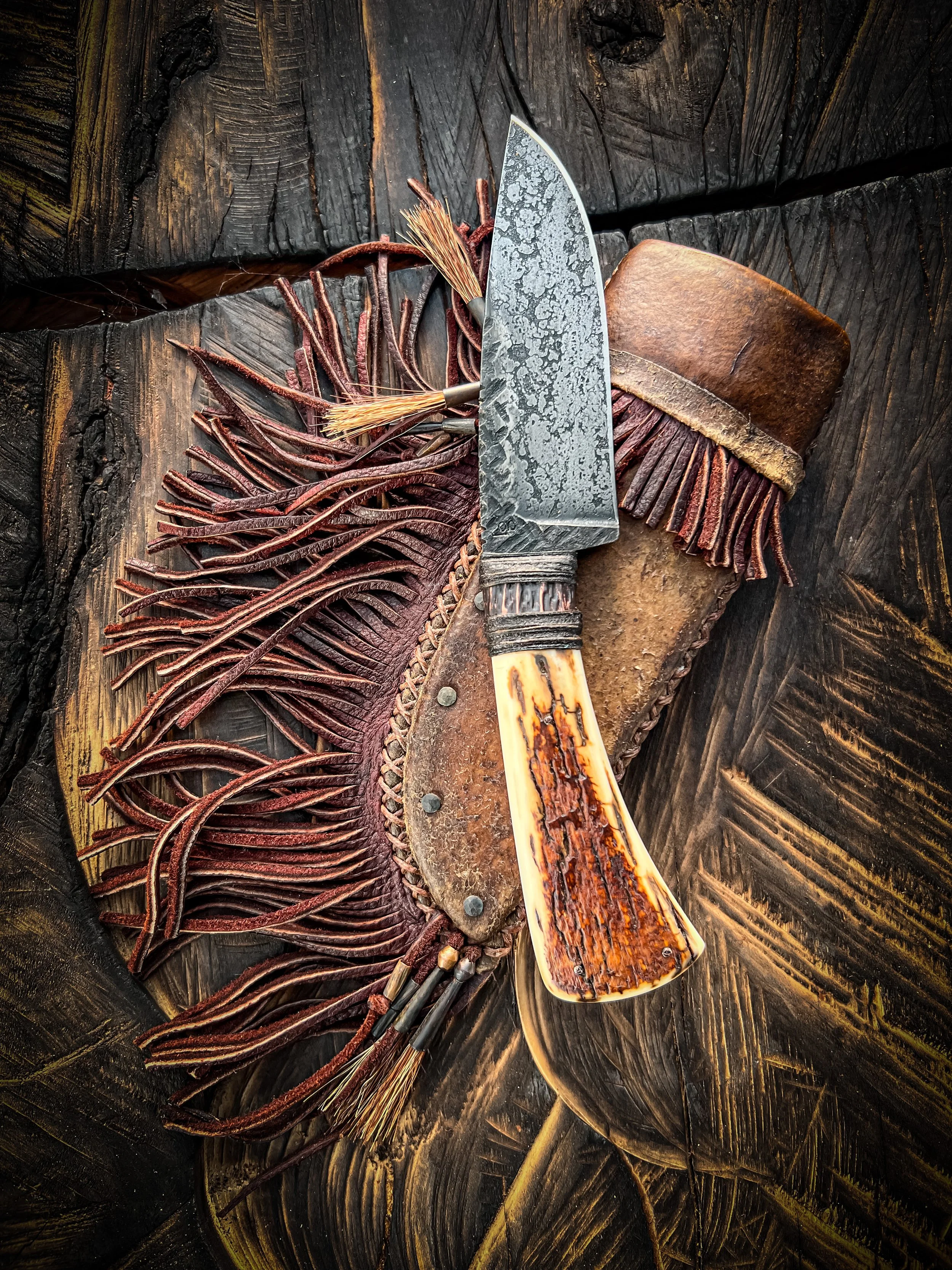 Sold - Small Hunter with crusted mammoth 