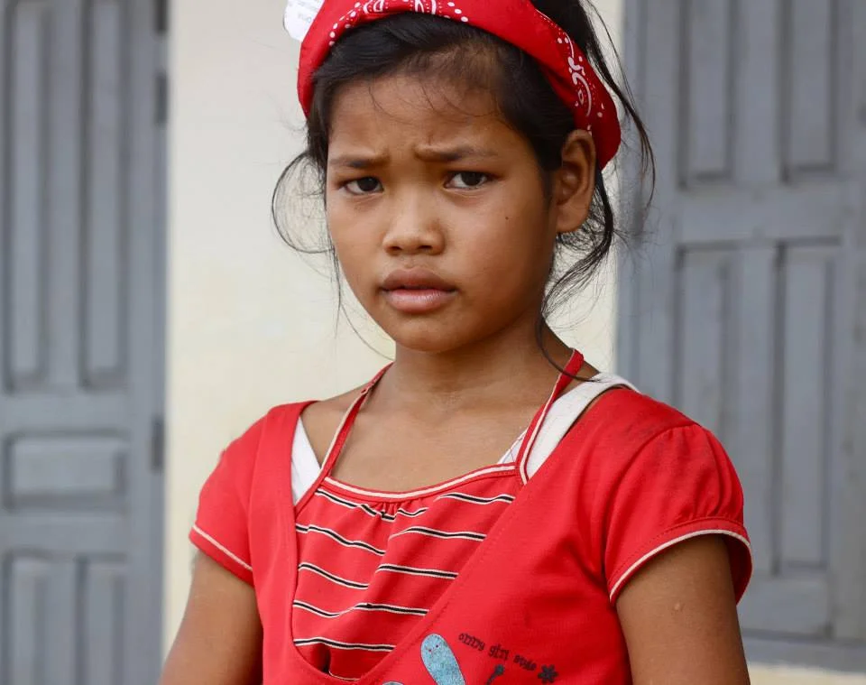 Srey Mom's little sister, Wong - working so she may see a new landscape. 