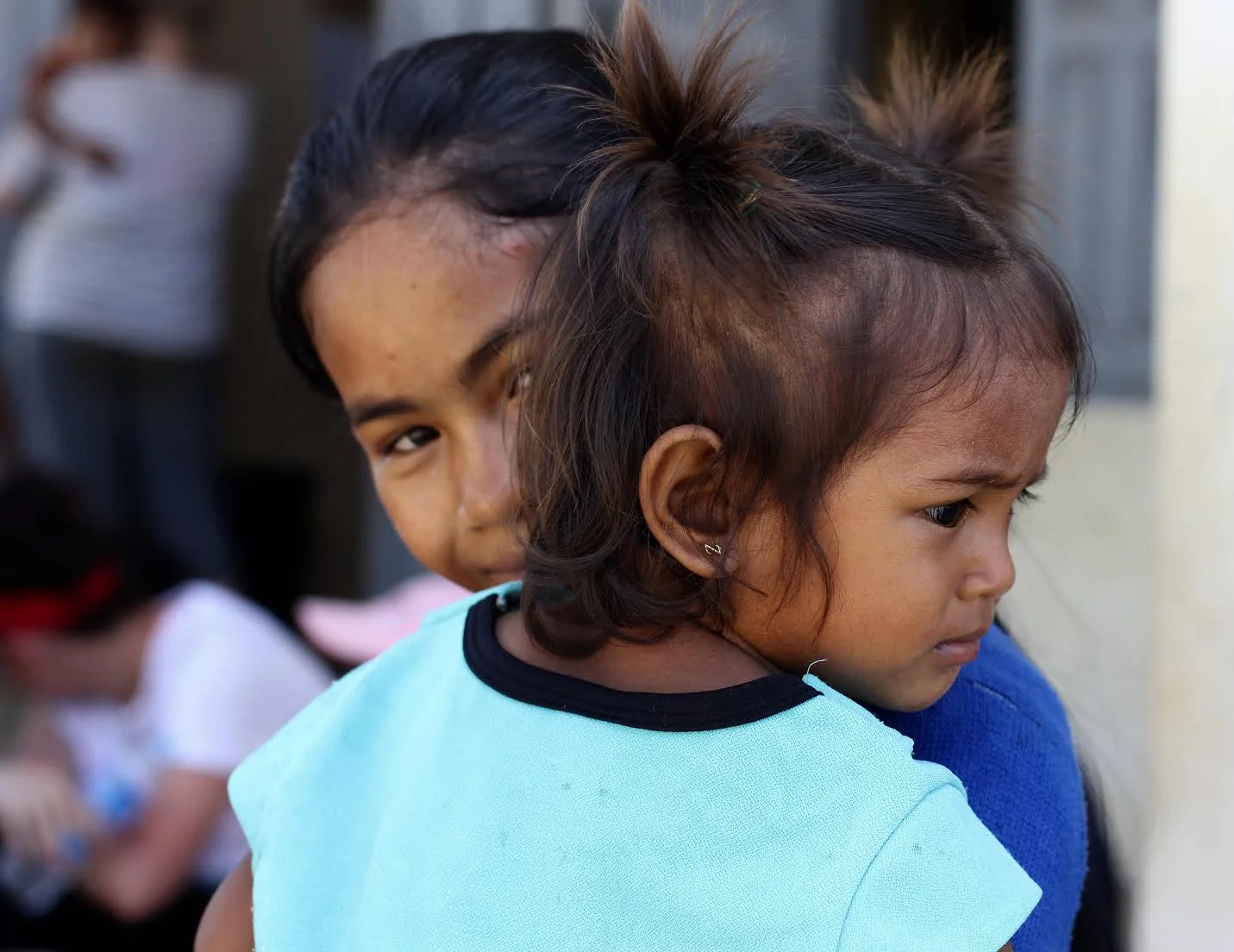 Som Kim's two daughters, the older almost subjected to slavery out of desperation. 