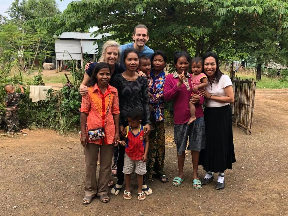 Director Karla and Zach stand with the new Landmine Design Artisans in Cambodia in January 2018