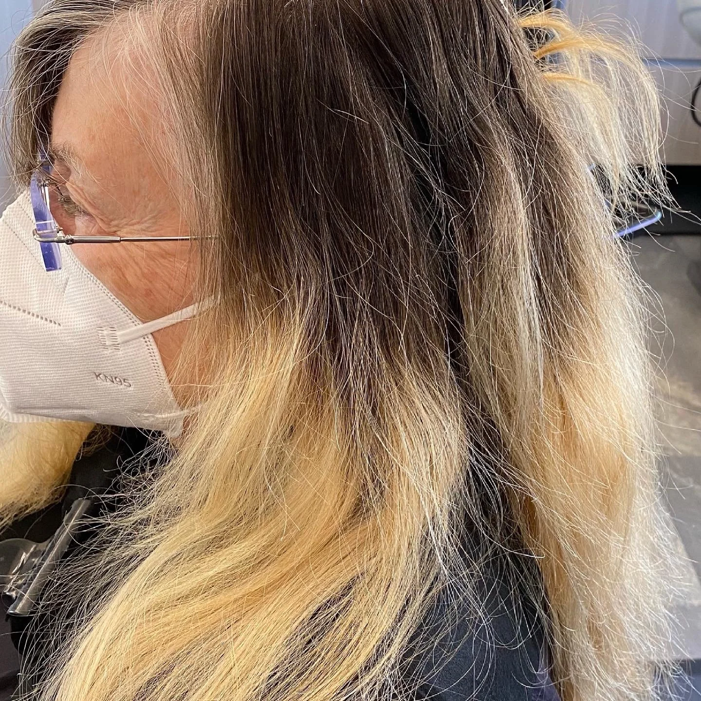 Before corrective color treatment on grown-out blonde hair by Evet DeCota at Salon DeCota, San Rafael CA.