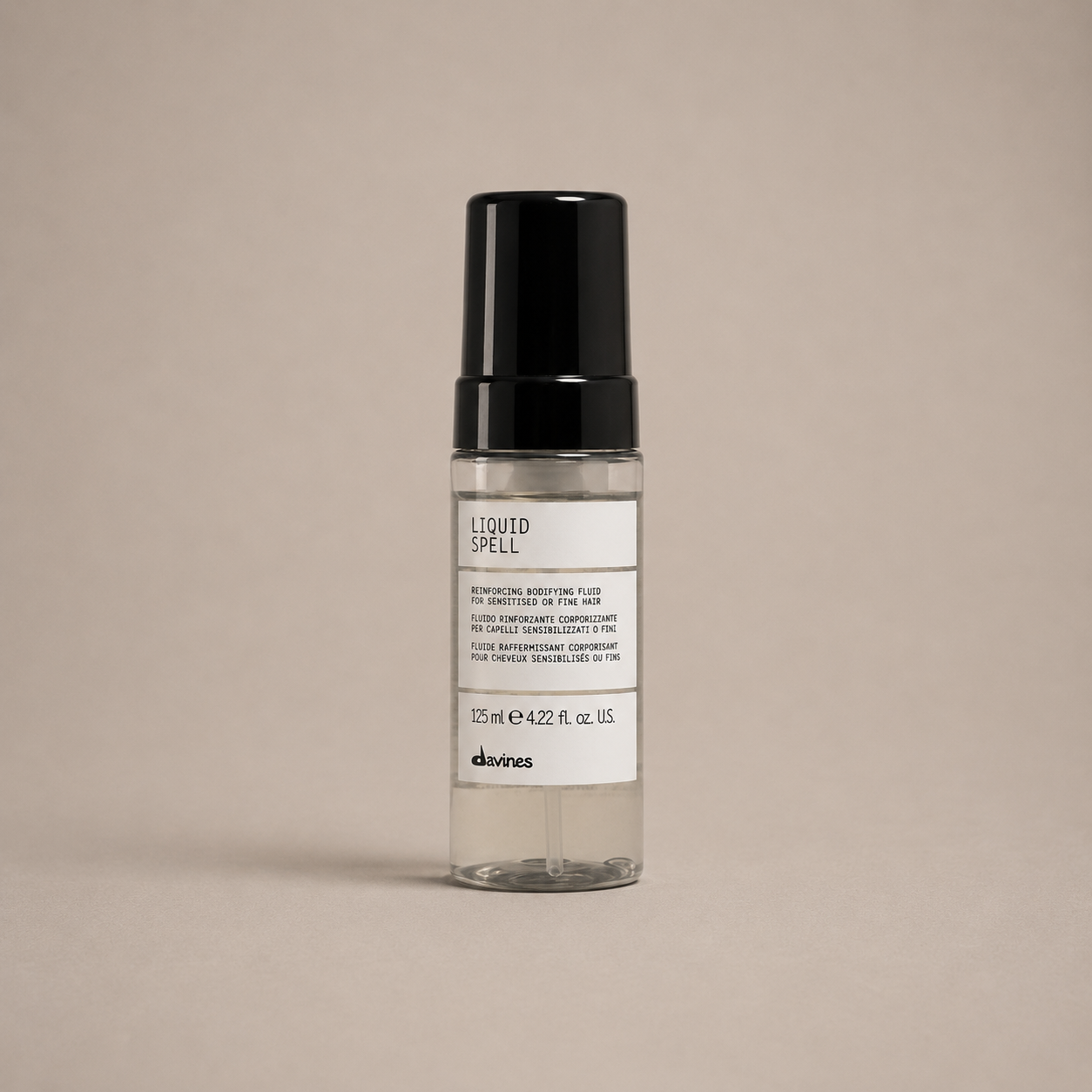 Davines Liquid Spell heat-activated amino acid treatment for strengthening and adding shine to damaged hair, available at Salon DeCota, San Rafael CA.