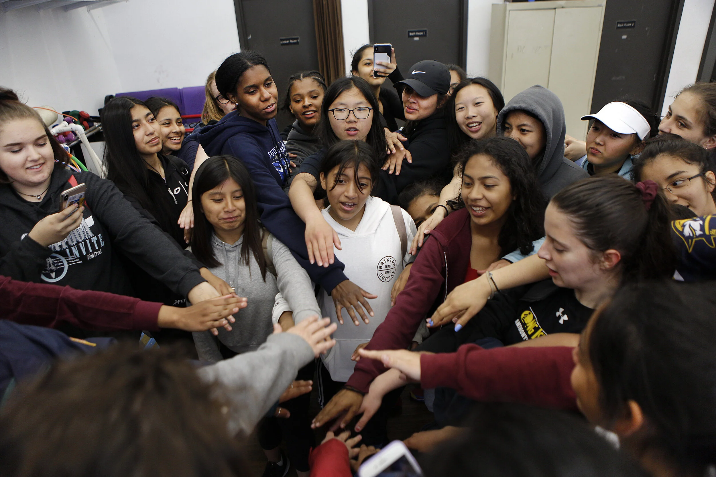  Young women in the Row New York Queens program huddle together at the end of practice on Thursday, May 2, 2019 at the World’s Fair Boathouse in Flushing Meadows Corona Park.  