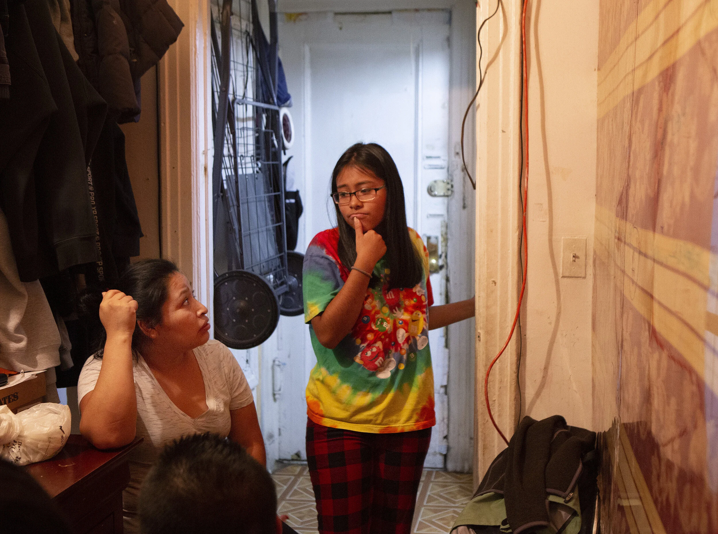  Sebastiana Lopez talks with her mother Cristina Cuevas late Friday evening in their apartment in Queens Oct. 11, 2019.  