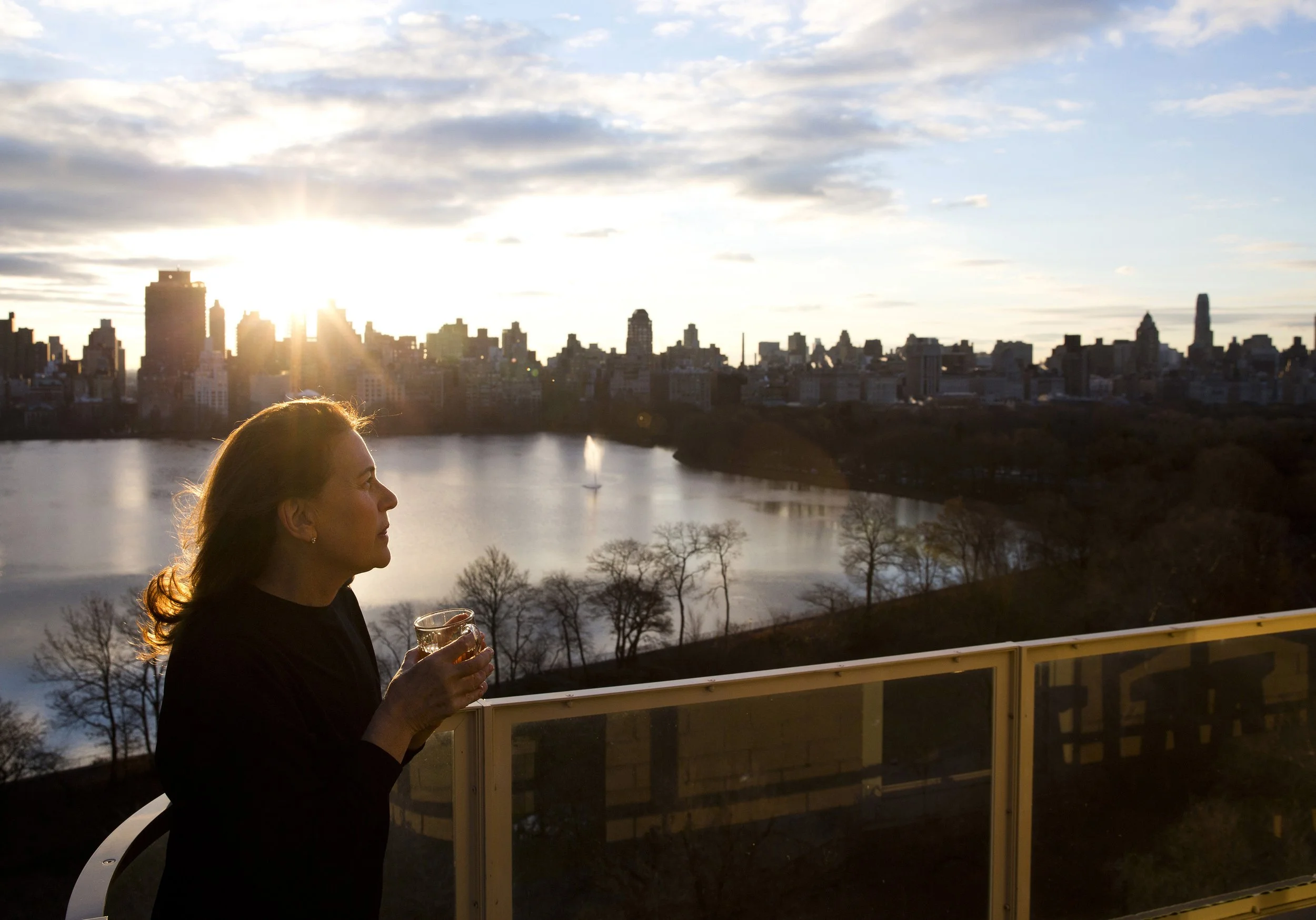  Nancy Fire, interior designer for Studio NYC Design, sips tea in the morning on her apartment balcony in the city. “How Nancy Fire, Interior Designer, Spends Her Sundays,” (Erica Lee for the New York Times) 