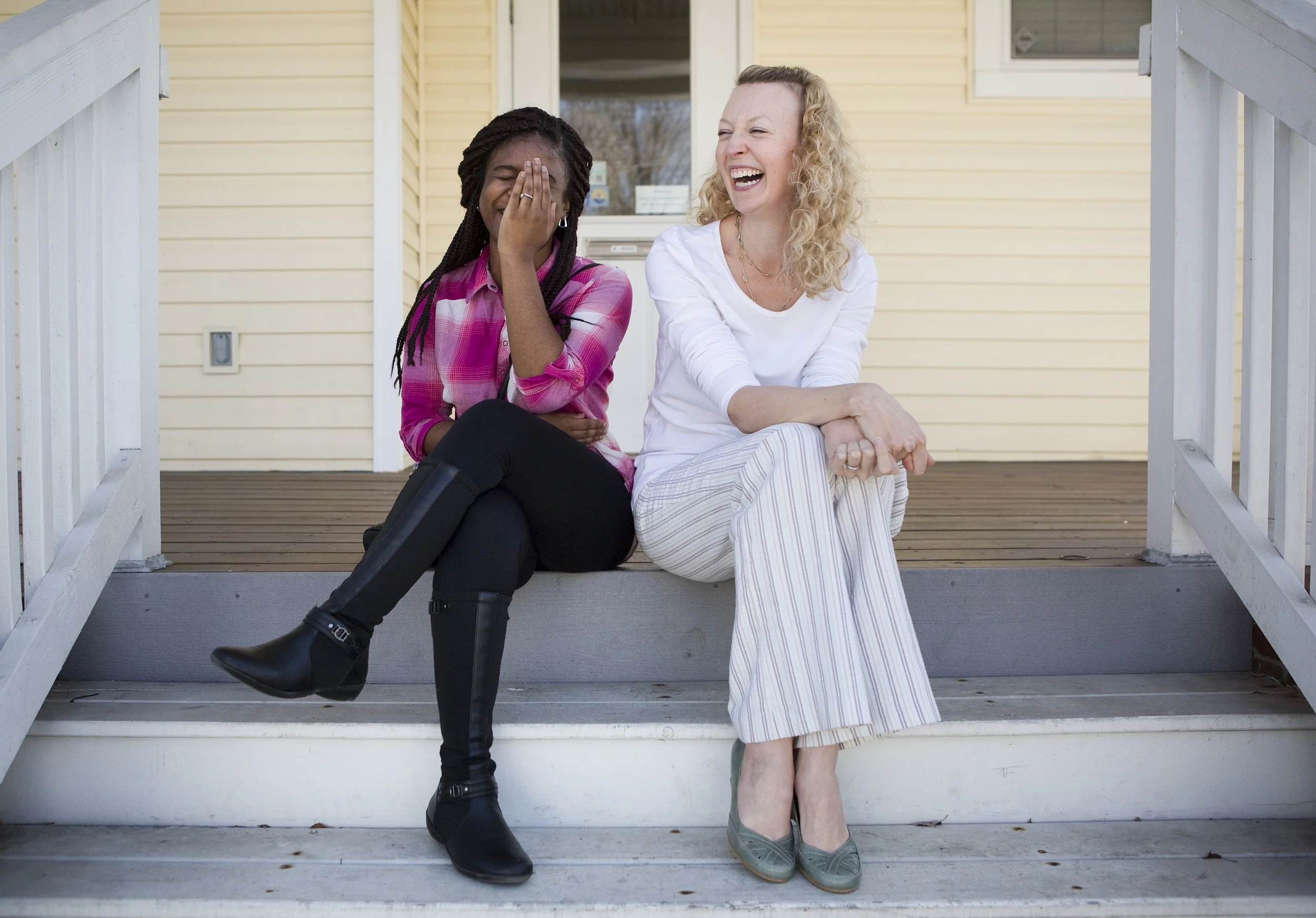  Jessica Surace Nelson, 35, and her Little Sister, Kianna Robinson, 17, sit on the stoops of the Big Brothers Big Sisters of Southwest Virginia house on Wells Avenue. Nelson and Robinson have been together for eleven years and Nelson has been named V