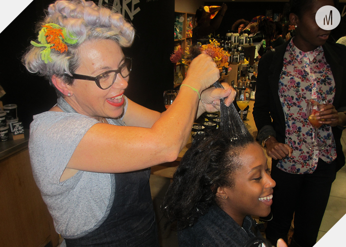 Wendy Millington applying a hair treatment
