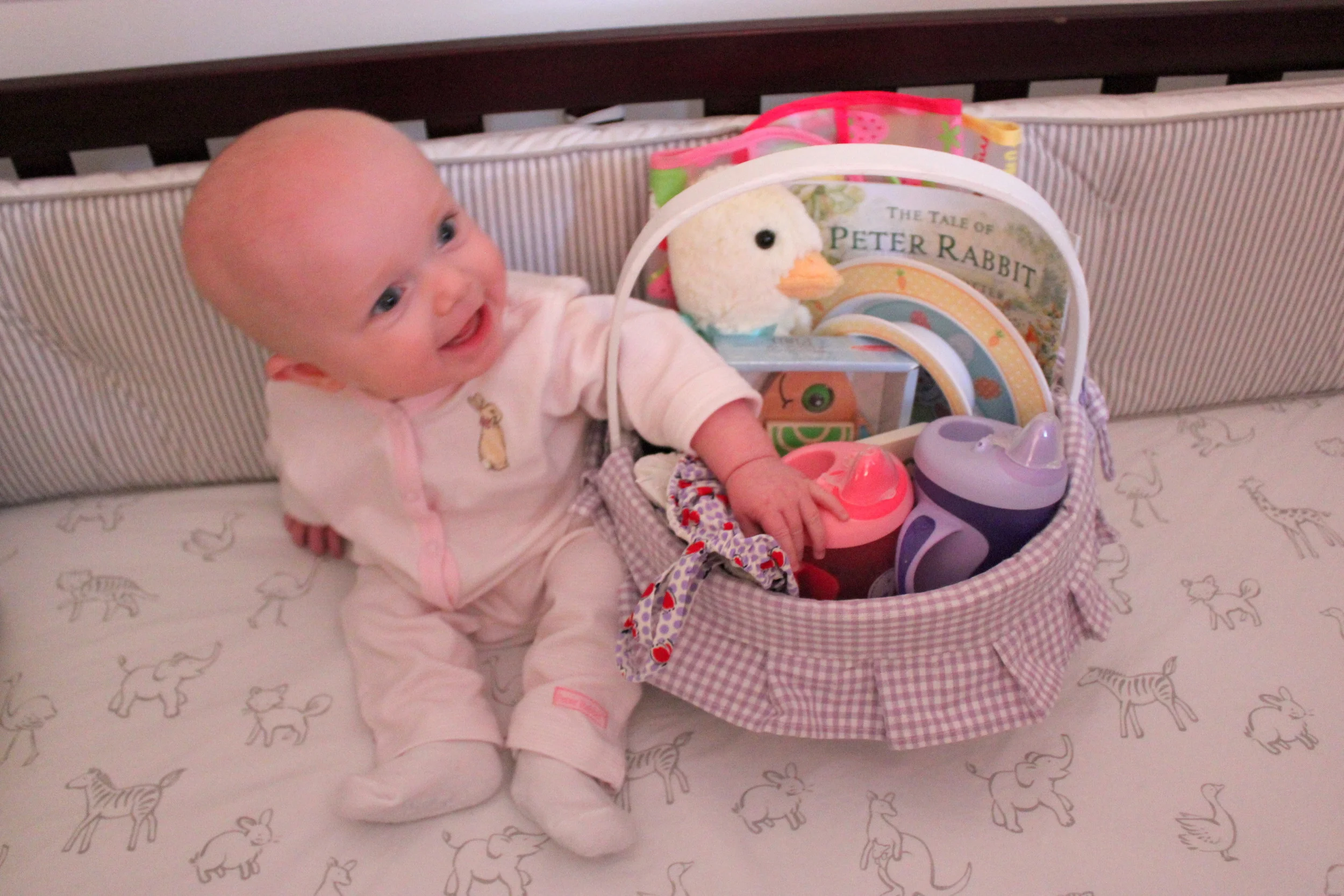 My sweet girl on her first Easter morning.  Special thanks to her cousin Colson for sharing his bed :)