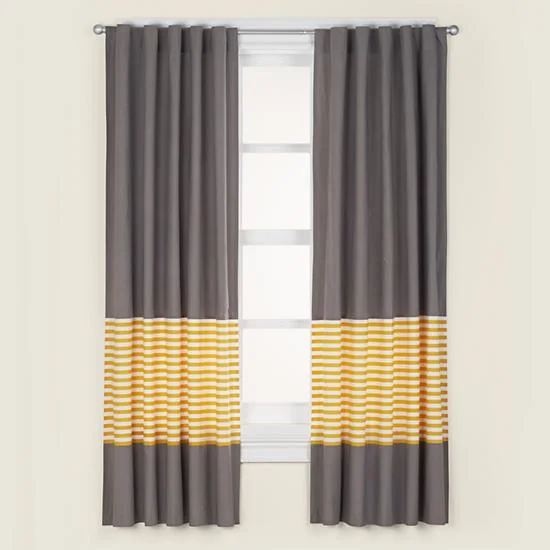 BAD! 1. The panels are just floating in the air. 2. The hardware is mounted at the molding. 3. The edge of the curtain is at the edge of the window, so that the panels cover the majority of the window.