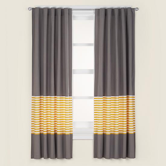 BAD! 1. The panels are just floating in the air. 2. The hardware is mounted at the molding. 3. The edge of the curtain is at the edge of the window, so that the panels cover the majority of the window.