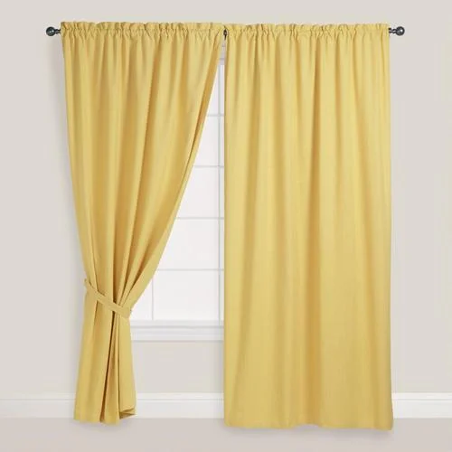 BAD! 1. Again, the edge of the panel is at the edge of the window--too much window is covered. 2. the panel is not wide enough for this window--notice how it is pulled so there is very little pleating or folding in the panel.