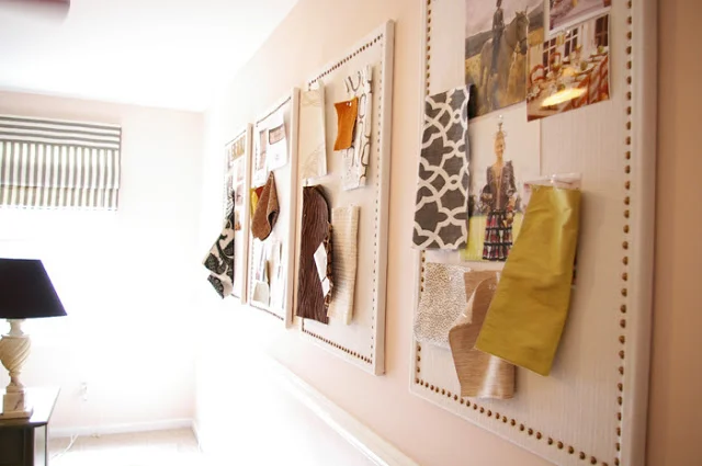 Or turn an ordinary cord board into something beautiful with linen fabric and decorative nail heads.