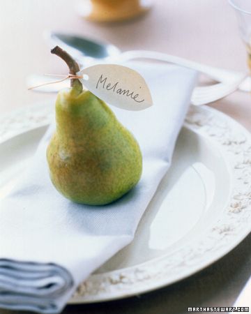 Fruits and veggies make great place card stands. Grab seasonal favorites at the farmer's market or local grocery. Pumpkins (I prefer white) are a great choice as well, but I love the green these pears bring to a table. Source