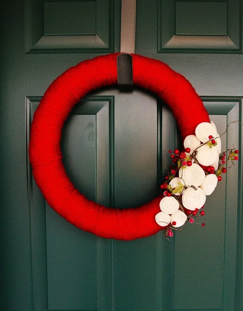I'm not against a yarn wreath. They can be elegant, and they speak to my quirky/artsy side. But you've gotta be careful with these too. They can get too elementary or too busy really fast.