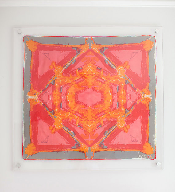Love the idea of framing a scarf. Image via Highland Hardware