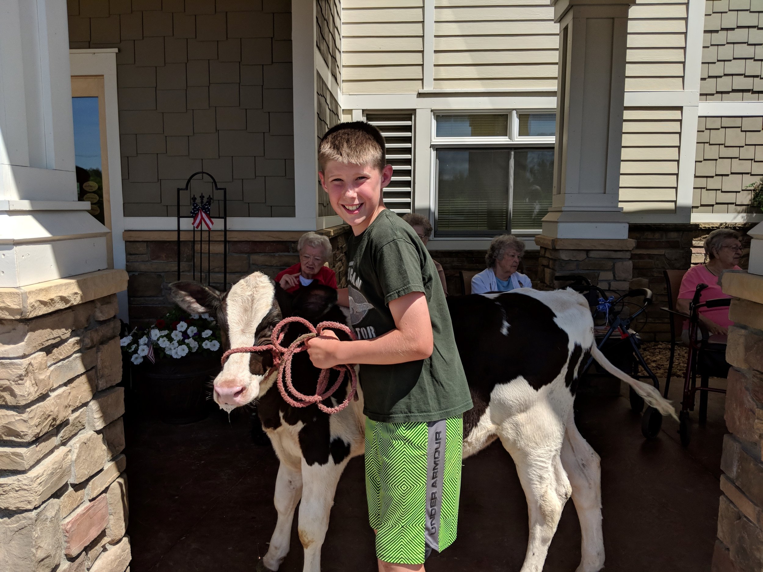 A visit from a fair calf & a donkey!! Thank you Courtney for sharing your time and animals with our tenants! 2.jpg