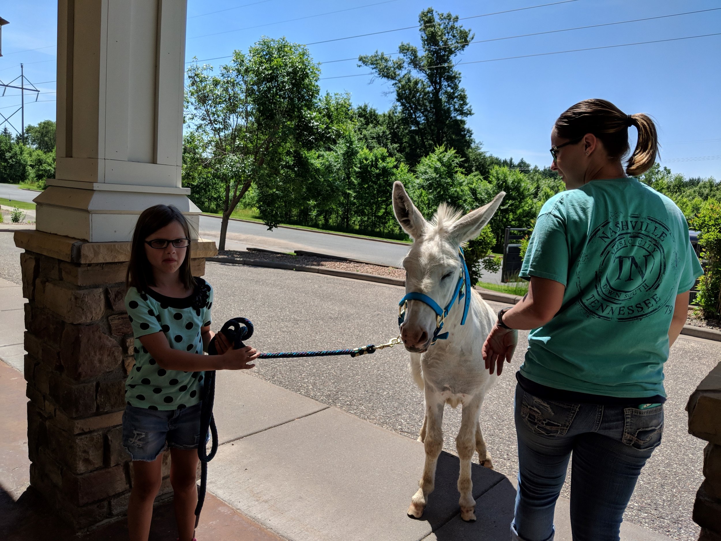 A visit from a fair calf & a donkey!! Thank you Courtney for sharing your time and animals with our tenants! 3.jpg