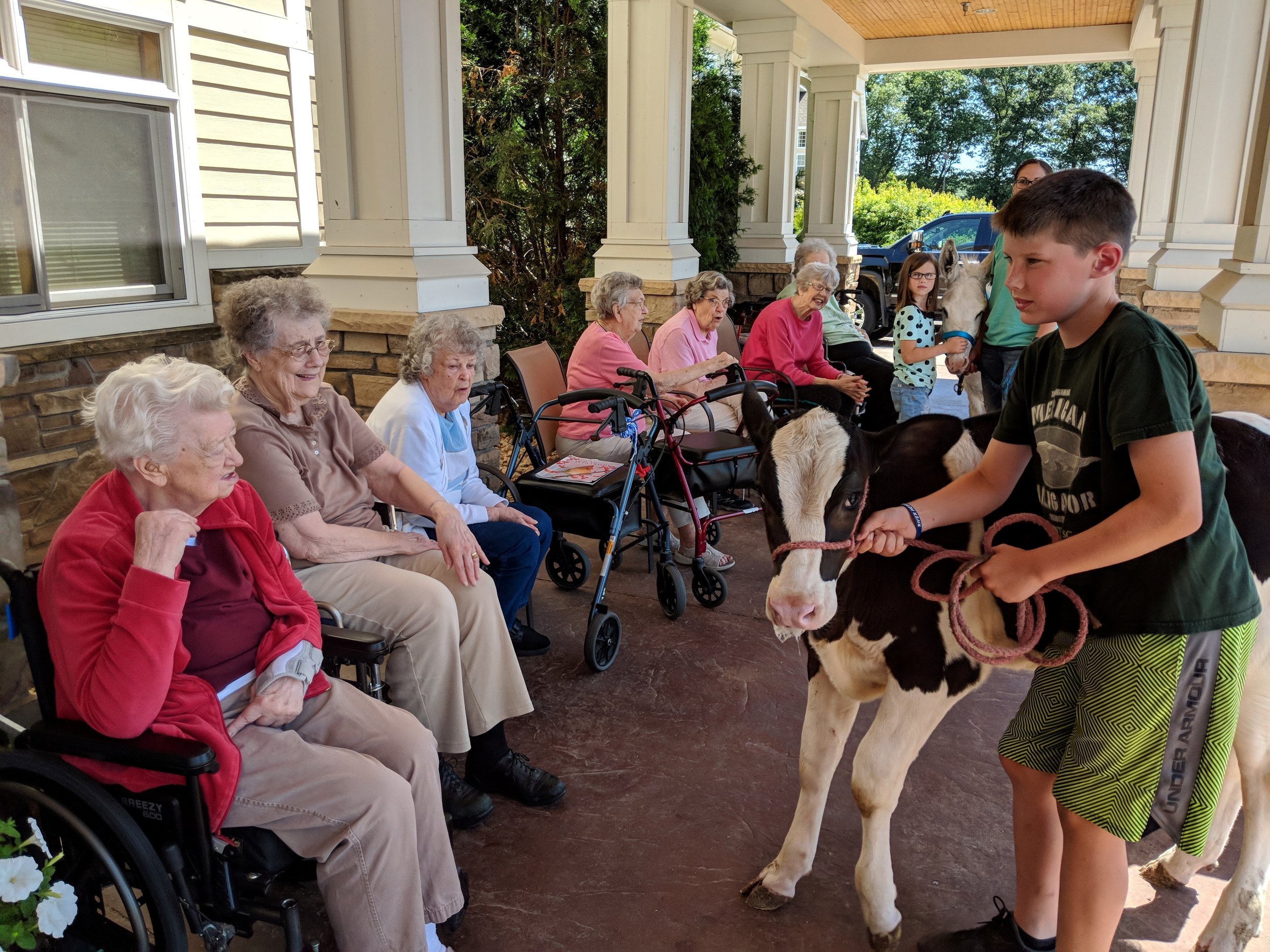 A visit from a fair calf & a donkey!! Thank you Courtney for sharing your time and animals with our tenants! 4.jpg