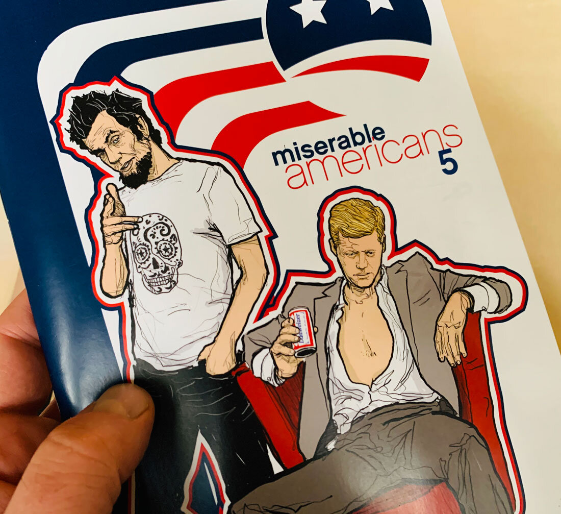 Photo of the actual printed comic book Miserable Americans by Evan Derian