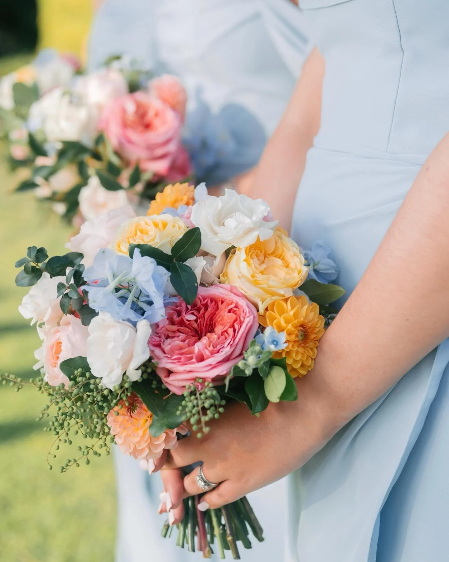 Bridesmaids in blue, bouquets in full bloom. 

Wp: @paolocicognani_weddingsitaly 
Photographer: @landvphotography 
Venue: @tenutadisticciano 
Video: @veilinthewind_weddingfilms 
Flowers: @stiatti_fiori_ 
Catering: @rolands_florence 
Stationery: @laur