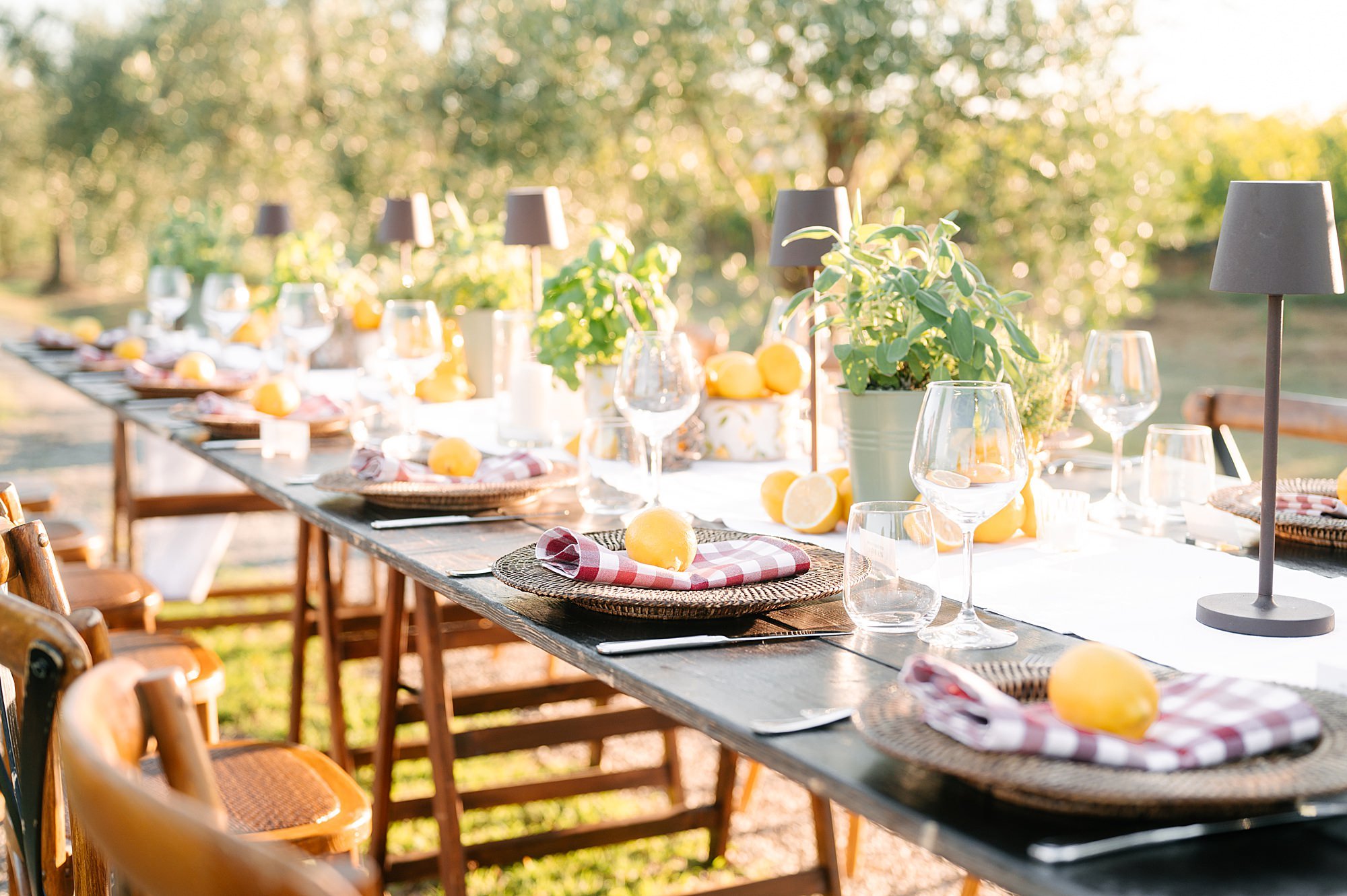 Chic Italian pizza party at a Tuscan villa with long wooden tables and lemon decor