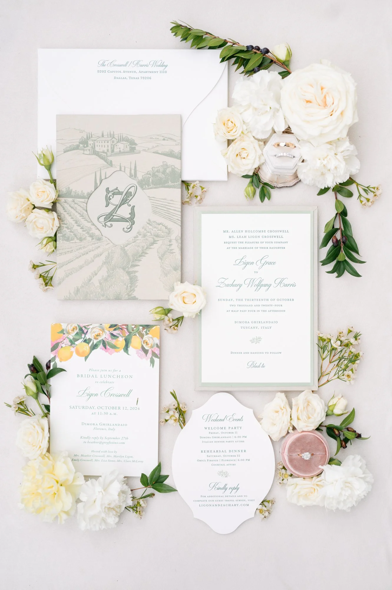 Editorial Flatlay of a wedding invitation suite on handmade Amalfi paper with vintage ribbons and gold rings, seal wax, styled by a luxury editorial photographer in Tuscany