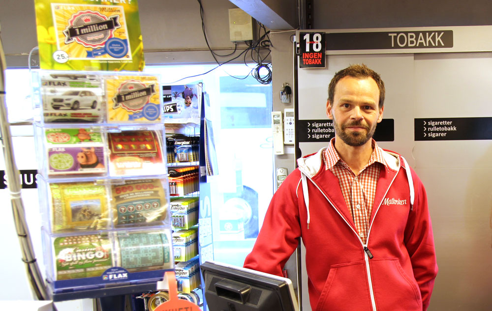 Mann ved tippedisk