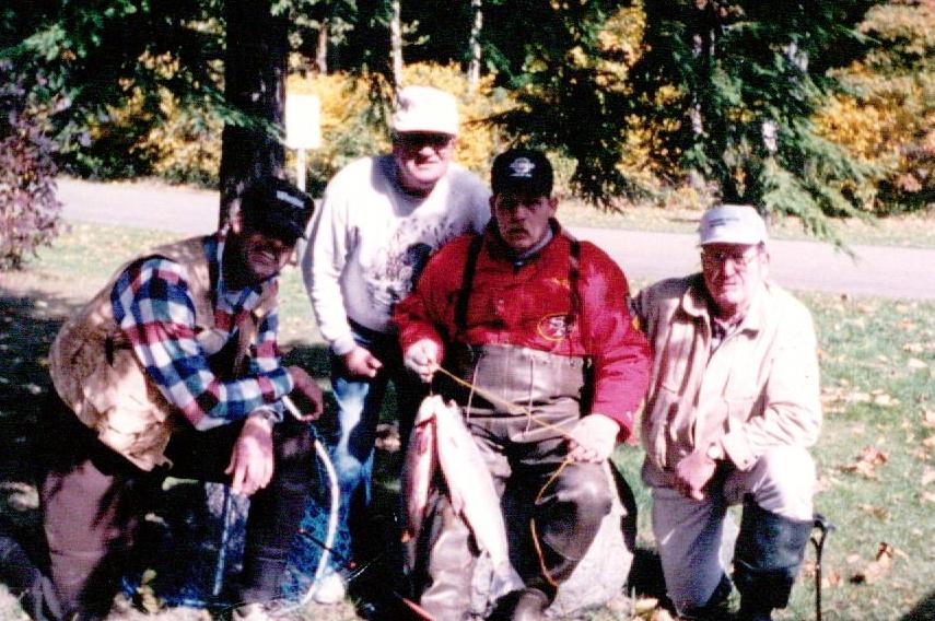 Craig (far left) with some of his 'fishing family'