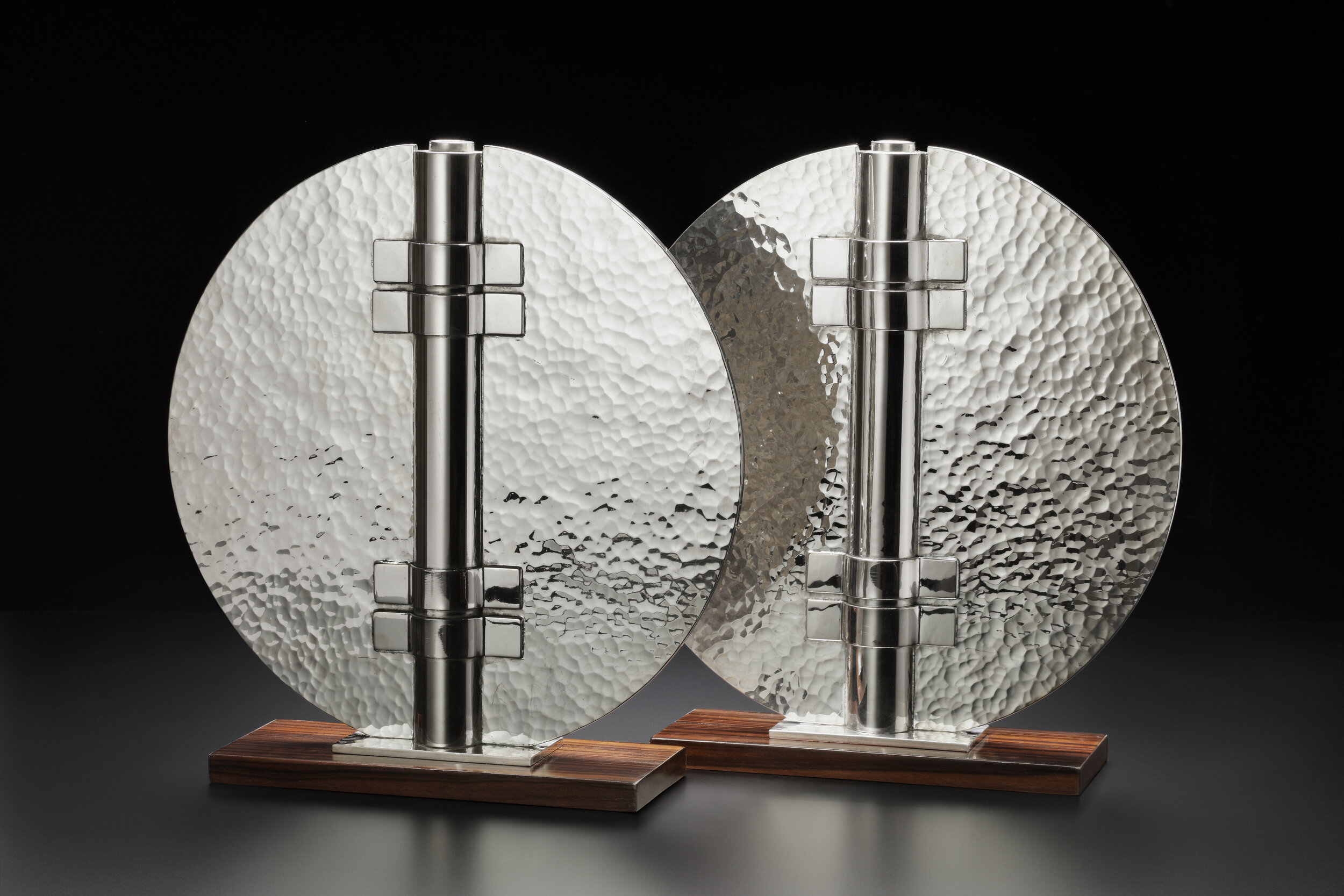 Jean Després (1889-1980) Pair of vases Avallon (France), c. 1950 Silver metal and wood H: 36.4 cm - 34 cm x 10 cm Ref: Melissa Gabardi, Jean Desprès, London 2009, page 138-139; Yvonne Brunhammer, The Style of the 1930s to the