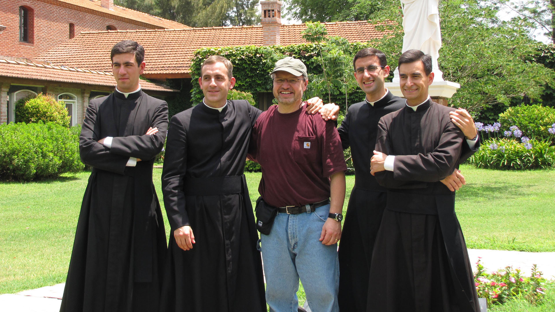 bob with preists.jpg