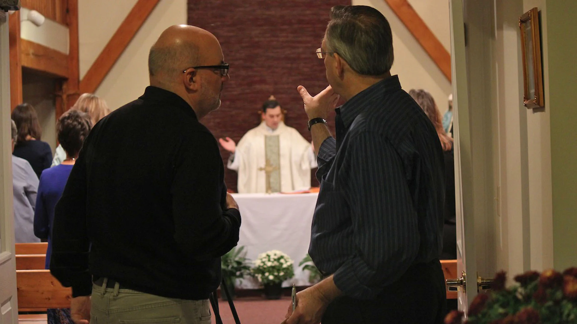 directing fr john in background.jpg
