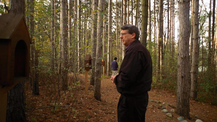 Man turns to Jesus in the woods.jpg