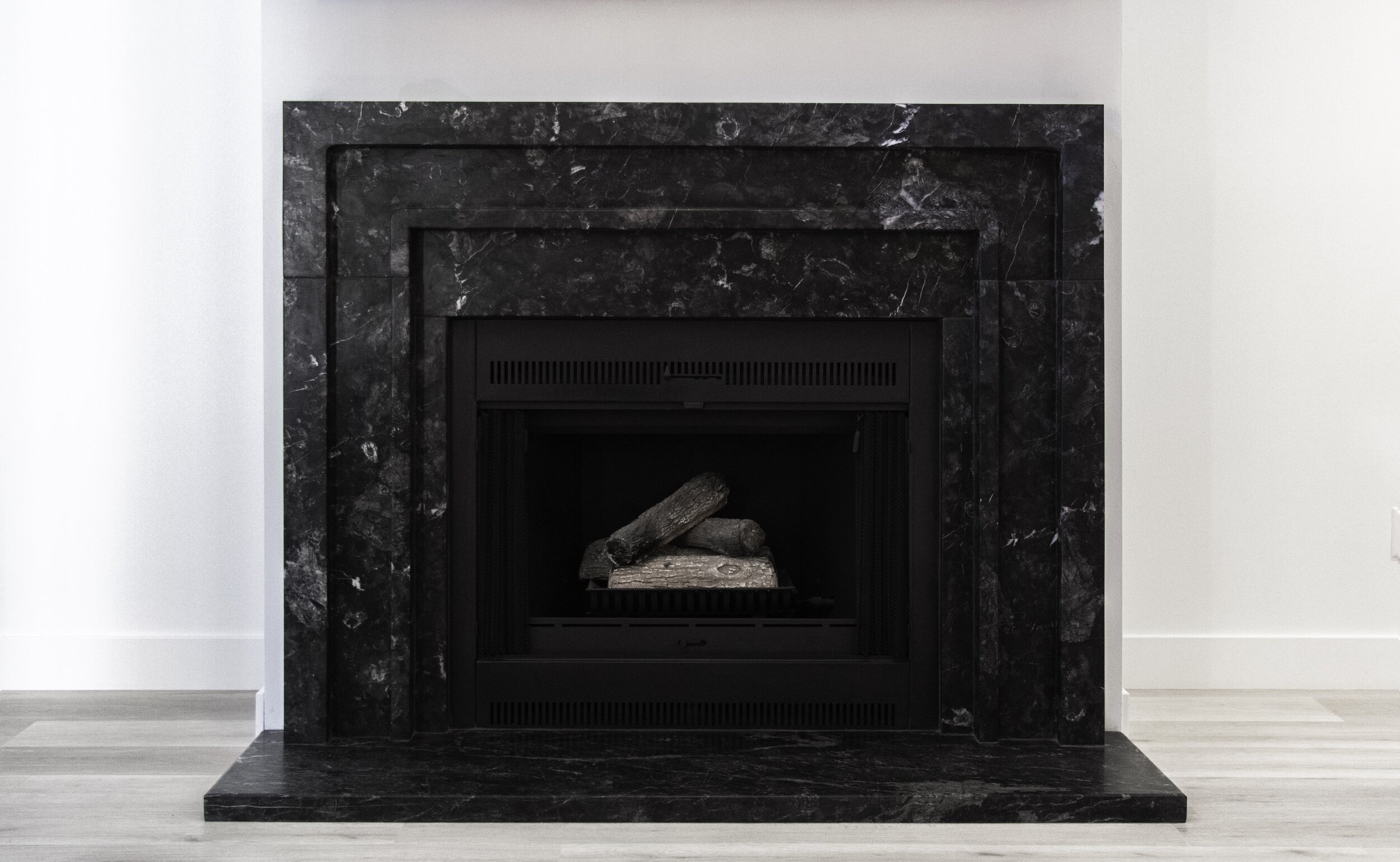 Custom Black Marble Fireplace Surround | Castelli Marble Custom Black Marble Fireplace Surround | Castelli Marble